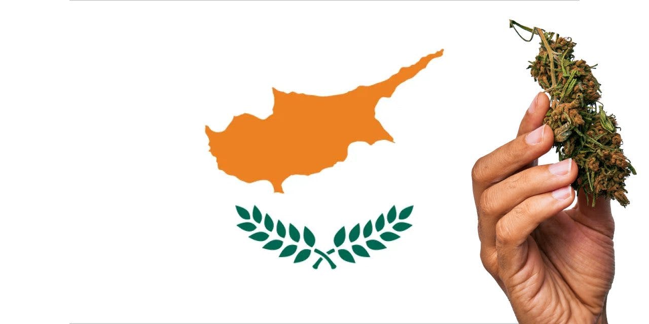 Cyprus flag with marijuana in front of it