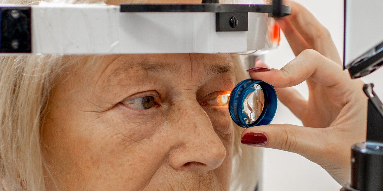 eye checkup of an older woman