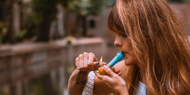 a woman smoking weed