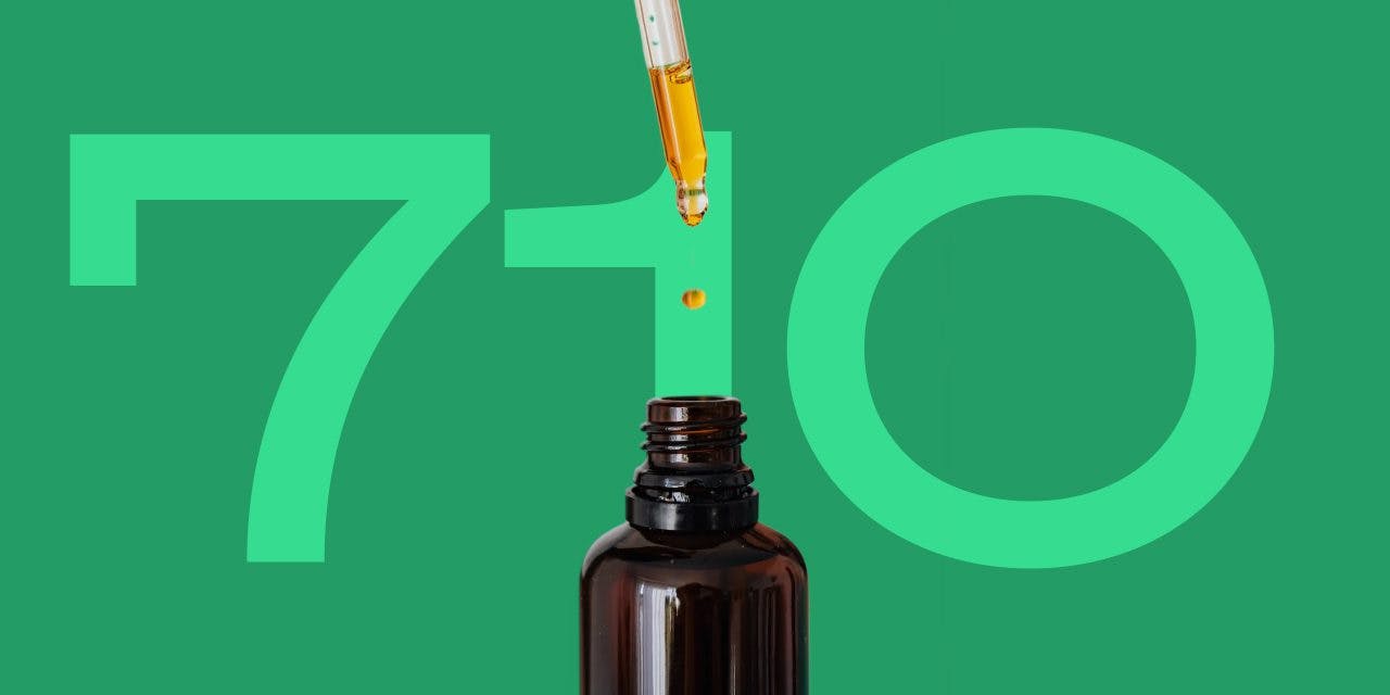 a dropping oil to bottle from a dropper and a 710 background