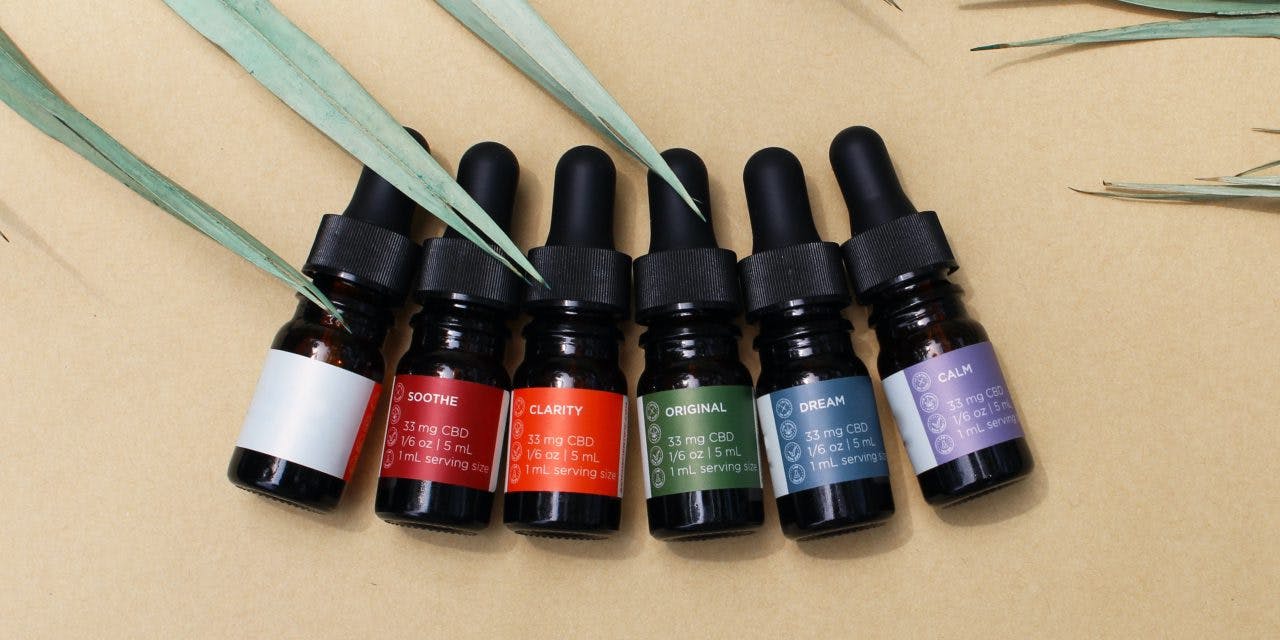 different variations of CBD tinctures in bottles